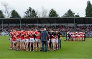 9 March 2014; The Cork and Derry teams gather together in their respective huddles after the game. Allianz Football League, Division 1, Round 4, Cork v Derry, Pairc Ui Rinn, Cork. Picture credit: Diarmuid Greene / SPORTSFILE