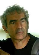 6 September 2005; Raymond Domenech, French football manager, sits on the team bus after arrival at Dublin Airport in advance of the World Cup Qualifying game against the Republic of Ireland. Dublin Airport, Dublin. Picture credit; Damien Eagers / SPORTSFILE