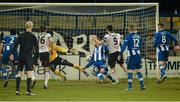 10 March 2014; Dundalk's Patrick Hoban, 9, scores his side's first goal despite the attempts of Coleraine goalkeeper Eugene Ferry and Steven Douglas. Setanta Sports Cup Quarter-Final 2nd leg, Coleraine v Dundalk, Showgrounds, Coleraine, Co. Derry. Picture credit: Oliver McVeigh / SPORTSFILE