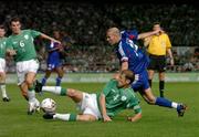7 September 2005; Zinedine Zidane, France, in action against Kenny Cunningham and Roy Keane, Republic of Ireland. FIFA 2006 World Cup Qualifier, Group 4, Republic of Ireland v France, Lansdowne Road, Dublin. Picture credit; David Maher / SPORTSFILE