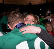 15 March 2014; Brian O'Driscoll is congratulated by his wife Amy Huberman after the game. RBS Six Nations Rugby Championship 2014, France v Ireland, Stade De France, Saint Denis, Paris, France. Picture credit: Matt Browne / SPORTSFILE