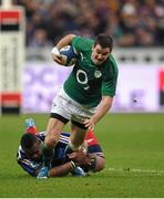 15 March 2014; Jonathan Sexton, Ireland, is tackled by Mathieu Bastareaud, France. RBS Six Nations Rugby Championship 2014, France v Ireland, Stade De France, Saint Denis, Paris, France. Picture credit: Stephen McCarthy / SPORTSFILE