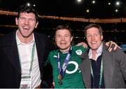 15 March 2014; Brian O'Driscoll, Ireland, celebrates after the game with former teammates Shane Horgan, left, and Ronan O'Gara. RBS Six Nations Rugby Championship 2014, France v Ireland, Stade De France, Saint Denis, Paris, France. Picture credit: Matt Browne / SPORTSFILE