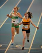 16 March 2014; Claire McSweeney, right, Leevale A.C., Co. Cork, crosses the line to win the Senior Women's 1,500m Final ahead of 2nd place Siobhan Eviston, Raheny Shamrocks, Co. Dublin , at the Woodie’s DIY Indoor Track and Field League Final. Athlone Institute of Technology International Arena, Athlone, Co. Westmeath. Photo by Sportsfile