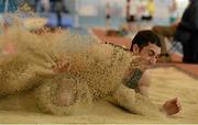16 March 2014; Keith Smith, Menapians A.C., Co. Wexford, competing in the Senior Men's Long Jump at the Woodie’s DIY Indoor Track and Field League Final. Athlone Institute of Technology International Arena, Athlone, Co. Westmeath. Photo by Sportsfile