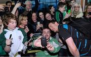 16 March 2014; Ireland's Brian O'Driscoll poses for a photograph with supporters after the teams return to Dublin. Ireland Rugby Squad Homecoming, Dublin Airport, Dublin. Picture credit: Matt Browne / SPORTSFILE