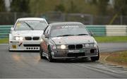 16 March 2014; Eric Holstein, BMW M3, leads Dave O'Brien, BMW E46, on his way to winning the Yokohama Irish Touring Car Championship race, during the Irish Championship Car Races. Mondello Park, Donore, Naas, Co. Kildare. Picture credit: Barry Cregg / SPORTSFILE