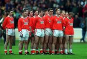 25 April 1999; The Armagh Team, led by captain Jarlath Burns, fifth from right, stand for The National Anthem ahead of the Church & General National Football League Division 1 Semi-Final match between Armagh and Dublin at Croke Park in Dublin. Photo by Ray McManus/Sportsfile