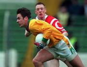 25 April 1999; Cormac Sullivan of Meath in action against Phillip Clifford of Cork during the Church & General National Football League Division 1 Semi-Final match between Cork and Meath at Croke Park in Dublin. Photo by Ray McManus/Sportsfile