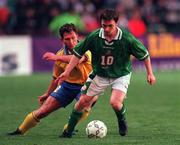 28 April 1999; David Connolly of Republic of Ireland in action against Pontus Kaamark of Sweden during the International friendly match between Republic of Ireland and Sweden at Lansdowne Road in Dublin. Photo By Brendan Moran/Sportsfile