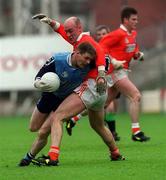 25 April 1999; Dessie Farrell of Dublin in action against Gerard Reid of Armagh during the Church & General National Football League Division 1 Semi-Final match between Armagh and Dublin at Croke Park in Dublin. Photo by Aoife Rice/Sportsfile