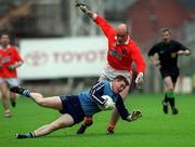 25 April 1999; Dessie Farrell of Dublin in action against Gerard Reid of Armagh during the Church & General National Football League Division 1 Semi-Final match between Armagh and Dublin at Croke Park in Dublin. Photo by Aoife Rice/Sportsfile