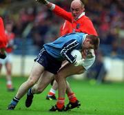25 April 1999; Dessie Farrell of Dublin in action against Gerard Reid of Armagh during the Church & General National Football League Division 1 Semi-Final match between Armagh and Dublin at Croke Park in Dublin. Photo by Ray McManus/Sportsfile