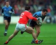 25 April 1999; Enda Sheehy of Dublin in action against Enda McNulty of Armagh during the Church & General National Football League Division 1 Semi-Final match between Armagh and Dublin at Croke Park in Dublin. Photo by Damien Eagers/Sportsfile