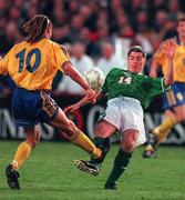 28 April 1999; Graham Kavanagh of Republic of Ireland in action against Henrik Larsson during the International friendly match between Republic of Ireland and Sweden at Lansdowne Road in Dublin. Photo By Brendan Moran/Sportsfile