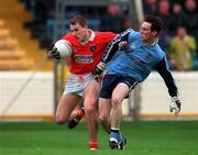 25 April 1999; Paddy McKeever of Armagh in action against Paddy Christie of Dublin during the Church & General National Football League Division 1 Semi-Final match between Armagh and Dublin at Croke Park in Dublin. Photo by Damien Eagers/Sportsfile