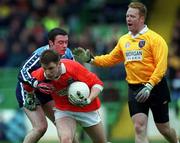 25 April 1999; Paul McGrane of Armagh in action against Ray Cosgrove of Dublin during the Church & General National Football League Division 1 Semi-Final match between Armagh and Dublin at Croke Park in Dublin. Photo by Ray McManus/Sportsfile
