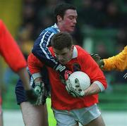 25 April 1999; Paul McGrane of Armagh in action against Ray Cosgrove of Dublin during the Church & General National Football League Division 1 Semi-Final match between Armagh and Dublin at Croke Park in Dublin. Photo by Ray McManus/Sportsfile