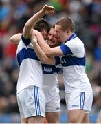 17 March 2014; St Vincent's players, from left, Michael Concarr, Luke Bree and Gavin Burke celebrate their side's victory following the final whistle. AIB GAA Football All-Ireland Senior Club Championship Final, Castlebar Mitchels, Mayo, v St Vincent's, Dublin. Croke Park, Dublin. Picture credit: Stephen McCarthy / SPORTSFILE