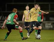 17 March 2014; Robert Bayly, Shamrock Rovers, in action against Stephen McAlorum, Glentoran. Setanta Sports Cup Quarter-Final 2nd leg, Glentoran v Shamrock Rovers, The Oval, Belfast, Co. Antrim. Picture credit: Oliver McVeigh / SPORTSFILE