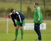 4 October 2005; Republic of Ireland manager Brian Kerr speaks to John O'Shea during squad training. Malahide FC, Malahide, Dublin. Picture credit: Damien Eagers / SPORTSFILE