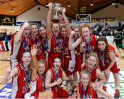 20 March 2014; Holy Faith Clontarf captains Aoibheann Byrne, left, and Katie Murray lift the cup as their team mates celebrate. Basketball Ireland All-Ireland Schools U19 A Girls Final, Holy Faith Clontarf v St Vincent's Cork, National Basketball Arena, Tallaght, Co. Dublin. Picture credit: Matt Browne / SPORTSFILE