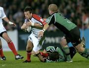 7 October 2005; Bryan Cunningham, Ulster, is tackled by Stephen Knoop,3, and John Fogarty, Connacht. Celtic League 2005-2006, Group A, Ulster v Connacht, Ravenhill, Belfast. Picture credit: Matt Browne / SPORTSFILE