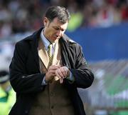 8 October 2005; Northern Ireland manager Lawrie Sanchez checks his watch during the game. FIFA 2006 World Cup Qualifier, Northern Ireland v Wales, Windsor Park, Belfast. Picture credit: Oliver McVeigh / SPORTSFILE