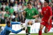 8 October 2005; David Healy, Northern Ireland, in action against Paul Jones, Wales. FIFA 2006 World Cup Qualifier, Northern Ireland v Wales, Windsor Park, Belfast. Picture credit: Oliver McVeigh / SPORTSFILE