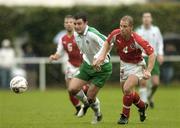 11 October 2005; Robert Brosnan, An Garda Siochana, in action against Remo Marti, Swiss Police. 2006 European Police Soccer Championship, Qualifying Round, An Garda Siochana v Swiss Police, Westmanstown Garda Sports Centre, Dublin. Picture credit: Damien Eagers / SPORTSFILE