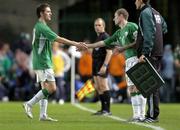 12 October 2005; Robbie Keane, Republic of Ireland, shakes hands with Stephen Elliott as he leaves the pitch. FIFA 2006 World Cup Qualifier, Group 4, Republic of Ireland v Switzerland, Lansdowne Road, Dublin. Picture credit: Brian Lawless / SPORTSFILE