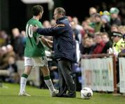 12 October 2005; Republic of Ireland manager Brian Kerr shakes hands with Robbie Keane after he substituted him. FIFA 2006 World Cup Qualifier, Group 4, Republic of Ireland v Switzerland, Lansdowne Road, Dublin. Picture credit: Brian Lawless / SPORTSFILE