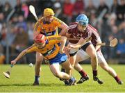 23 March 2014; Jack Browne, Clare, in action against Conor Cooney, Galway. Allianz Hurling League Division 1A Round 5, Clare v Galway, Cusack Park, Ennis, Co. Clare. Picture credit: Ray Ryan / SPORTSFILE