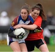 21 March 2014; Julia White, University of Limerick, in action against Aobha Hickey, University College Cork. O'Connor Cup, Semi-Final, University of Limerick v University College Cork. Queen's University, Belfast, Co. Antrim. Picture credit: Oliver McVeigh / SPORTSFILE