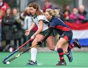 28 March 2014; Lillian Matthews, Salerno, in action against Judith Edgar, Lurgan College.  Electric Ireland Kate Russell All-Ireland School Girls Hockey Final Tournament, Salerno, Co. Galway v Lurgan College, Co. Armagh. St Andrews College, Booterstown, Co Dublin. Picture credit: Matt Browne / SPORTSFILE