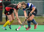 28 March 2014; Michelle Barrett, Crescent College, in action against Cheyenne Holmes, Kilkenny College. Electric Ireland Kate Russell All-Ireland School Girls Hockey Final Tournament, Crescent College, Co. Limerick v Kilkenny College, Co. Kilkenny. St Andrews College, Booterstown, Co. Dublin. Picture credit: Matt Browne / SPORTSFILE