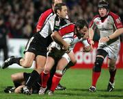 4th November 2005; Ulster's James Topping in action against Andrew Bishop,Ospreys. Celtic League, Ulster v Ospreys, Ravenhill Park, Belfast.Picture Credit:Oliver Mc Veigh/Sportsfile