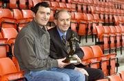 10 November 2005; Shelbourne's Jason Byrne, left, who was presented with the eircom / Soccer Writers Association of Ireland Player of the Month award for October by Padraig Corkery, eircom Head of Sponsorship. Tolka Park, Dublin. Picture credit: Brian Lawless / SPORTSFILE
