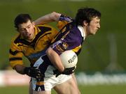 13 November 2005; Brian McGrath, Kilmacud Crokes, in action against Conor O'Donoghue, St. Peter's. Leinster Club Senior Football Championship Quarter-Final, St. Peter's v Kilmacud Crokes, Pairc Tailteann, Navan, Co. Meath. Picture credit: Damien Eagers / SPORTSFILE