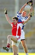 13 November 2005; Jimmy Larkin, St. Senans Kilkee, in action against Fergus Melody, Monaleen. Munster Club Senior Football Championship, Monaleen v St. Senans Kilkee, Gaelic Grounds, Limerick. Picture credit: Kieran Clancy / SPORTSFILE