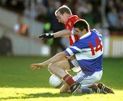 13 November 2005; Barry Harte, St. Senans Kilkee, in action against Mark Cummins, Monaleen. Munster Club Senior Football Championship, Monaleen v St. Senans Kilkee, Gaelic Grounds, Limerick. Picture credit: Kieran Clancy / SPORTSFILE