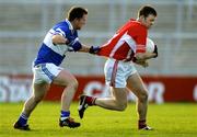 13 November 2005; John Cormican, Monaleen, in action against Derek Garvey, St. Senans Kilkee. Munster Club Senior Football Championship, Monaleen v St. Senans Kilkee, Gaelic Grounds, Limerick. Picture credit: Kieran Clancy / SPORTSFILE