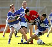 13 November 2005; Michael O'Shea, left and Thomas Galvin, St. Senans Kilkee, in action against Jason O'Brien, Monaleen. Munster Club Senior Football Championship, Monaleen v St. Senans Kilkee, Gaelic Grounds, Limerick. Picture credit: Kieran Clancy / SPORTSFILE