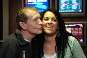 15 November 2005; Steve Davis kisses Michelle Cramp at the end of the match, Michelle who was one of six Boylesports customers who won the opportunity to play a game of pool against Steve Davis. Boylesports, Camden Street, Dublin. Picture credit: Damien Eagers / SPORTSFILE