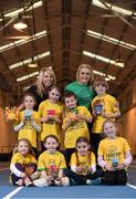 2 April 2014; Athletics Ireland and dried fruit and nut experts Forest Feast announced a new partnership which will support the growth of grassroot athletics in Ireland through the major sponsorship of Little Athletics. Christine Whelan, Forest Feast Field Sales Manager, and Irish Long Jump Record Holder Kelly Proper with Raheny Shamrock athletes, back row, from left; Georgie Murphy, age 5, Jill Meehan, age 6, Conor Brennan, age 5, Sean O'Connell, age 8, with, front row, from left; Rebecca O'Roruke, age 5, Ava Conroy, age 7, Aisling Savage, age 7, and Tara Hayden, age 8, at the launch of the partnership. Morton Stadium, Santry, Dublin. Picture credit: Stephen McCarthy / SPORTSFILE