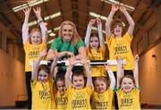 2 April 2014; Athletics Ireland and dried fruit and nut experts Forest Feast announced a new partnership which will support the growth of grassroot athletics in Ireland through the major sponsorship of Little Athletics. At the launch of the partnership is Irish Long Jump Record Holder Kelly Proper with athletes of the Raheny Shamrock Athletics Club, back row, from left, Tara Hayden, age 8, Aisling Savage, age 7, and Sean O'Connell, age 8, with, front row, from left, Jill Meehan, age 6, Georgie Murphy, age 5, Conor Brennan, age 5, Rebecca O'Rourke, age 5, and Ava Conroy, age 7. Morton Stadium, Santry, Dublin. Picture credit: Stephen McCarthy / SPORTSFILE