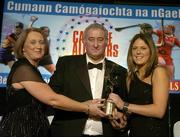 12 November 2005; Jemma O'Connor, from Cork, who was presented with her award by Ossie Kilkenny, Chairperson, of the Irish Sports Council and Miriam O'Callaghan, left, President, Cumann Camogaiochta na nGael, at the 2005 Camogie All-Star Awards, in association with O'Neills. Citywest Hotel, Dublin. Picture credit: Brendan Moran / SPORTSFILE