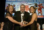 12 November 2005; Ciara Lucey, from Dublin, who was presented with her award by Ossie Kilkenny, Chairperson, of the Irish Sports Council and Miriam O'Callaghan, left, President, Cumann Camogaiochta na nGael, at the 2005 Camogie All-Star Awards, in association with O'Neills. Citywest Hotel, Dublin. Picture credit: Brendan Moran / SPORTSFILE