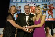 12 November 2005; Rachel Moloney, from Cork, who was presented with her award by Ossie Kilkenny, Chairperson, of the Irish Sports Council and Miriam O'Callaghan, left, President, Cumann Camogaiochta na nGael, at the 2005 Camogie All-Star Awards, in association with O'Neills. Citywest Hotel, Dublin. Picture credit: Brendan Moran / SPORTSFILE