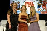 12 November 2005; Aoife McLoughney, right, from Tipperary, who was presented with her Young Player of the Year nominee award by Elaine Burke, Cork captain, and Miriam O'Callaghan, left, President, Cumann Camogaiochta na nGael, at the 2005 Camogie All-Star Awards, in association with O'Neills. Citywest Hotel, Dublin. Picture credit: Brendan Moran / SPORTSFILE